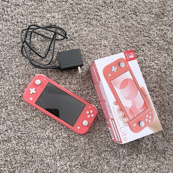 Nintendo Other - nintendo switch lite coral pink handheld gaming console
